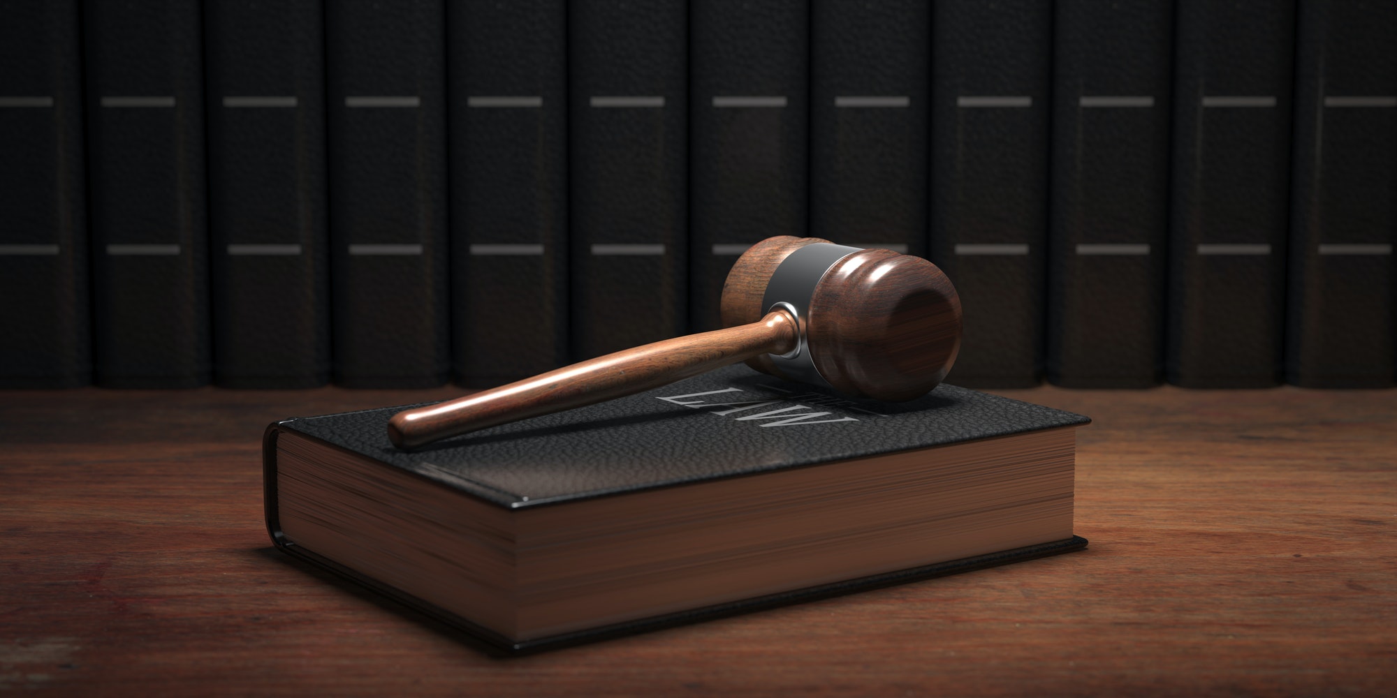 Judge gavel and law book, office desk background. 3d illustration