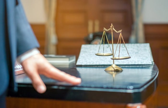 Soft focus of Judge think about the case that must be considered in the court